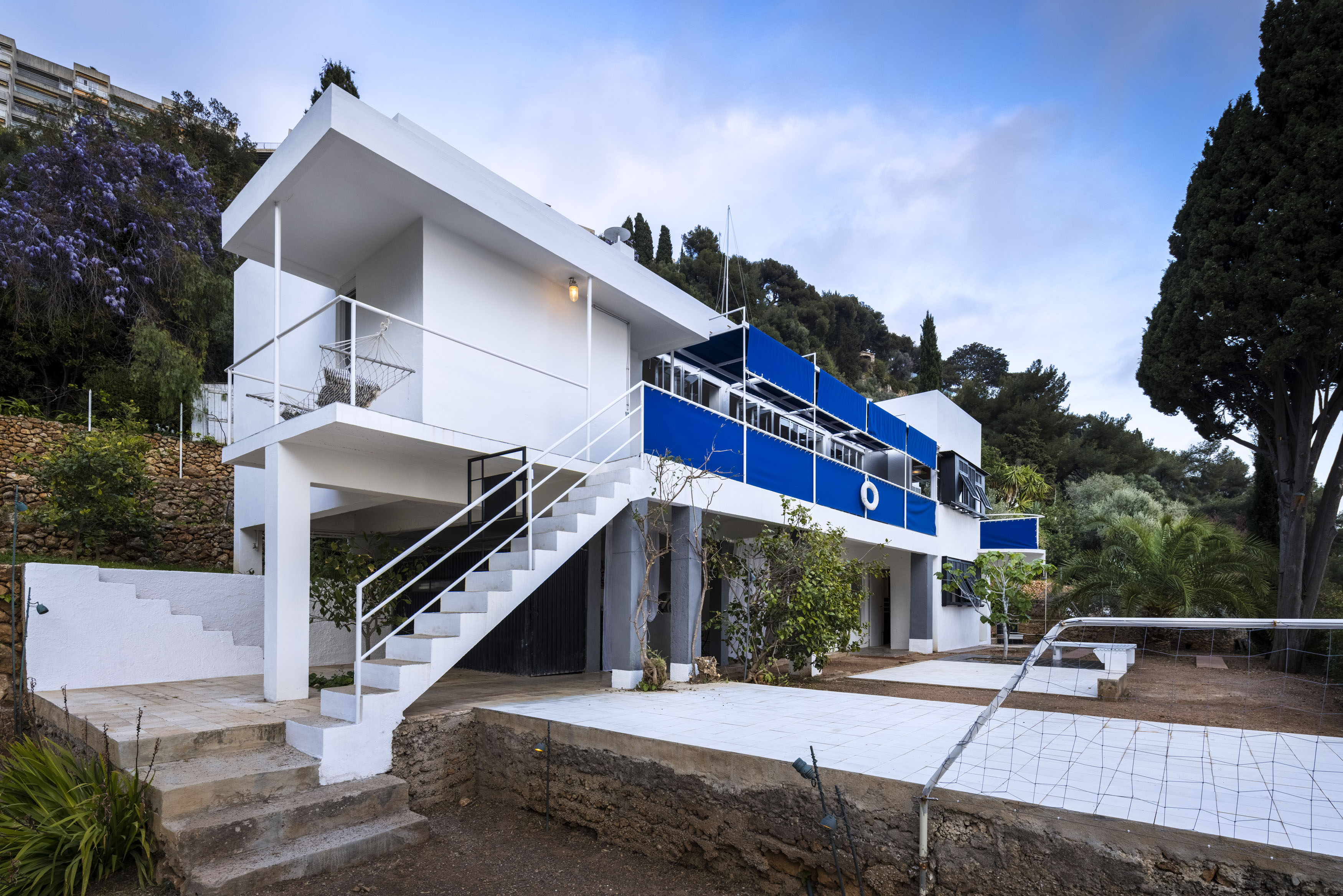 Eileen Gray house reopens, seen here a hero exterior against blue skies